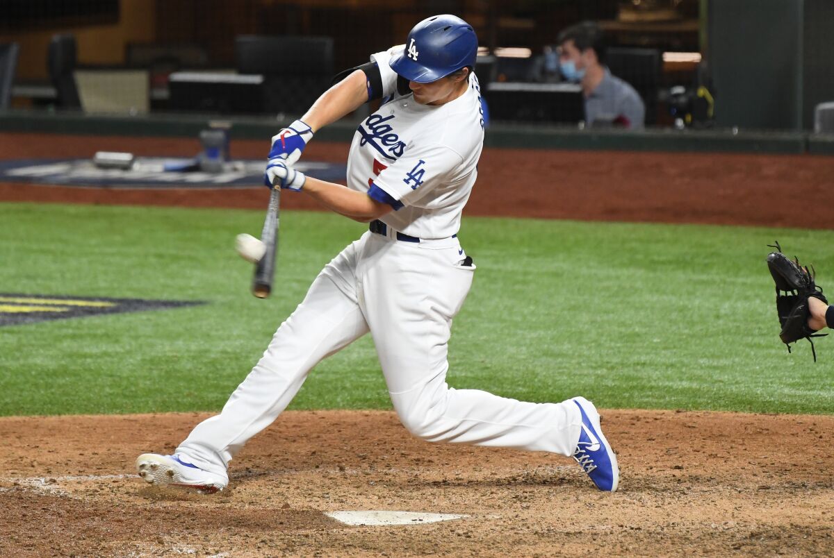 Dodgers shortstop Corey Seager hits a solo home run against the Rays in the eighth inning of Game 2.