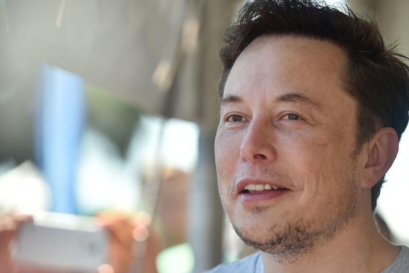(FILES) In this file photo taken on July 22, 2018 SpaceX, Tesla and The Boring Company founder Elon Musk attends the 2018 SpaceX Hyperloop Pod Competition, in Hawthorne, California on July 22, 2018. - Tesla chief executive Elon Musk disclosed on August 13, 2018, he was in talks with Saudi Arabia's sovereign wealth fund and other investors to take the electric automaker private. The revelation comes days after Musk's claim in an August 7 Twitter post that financing for a deal to take Tesla private had been "secured." (Photo by Robyn Beck / AFP)ROBYN BECK/AFP/Getty Images ** OUTS - ELSENT, FPG, CM - OUTS * NM, PH, VA if sourced by CT, LA or MoD **