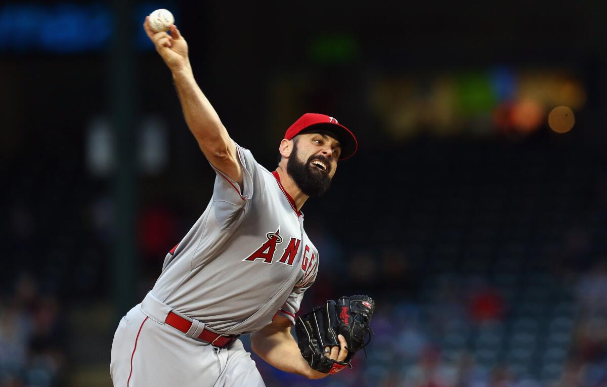 Angels starter Matt Shoemaker throws against the Texas Rangers in the first inning at Globe Life Park in Arlington.