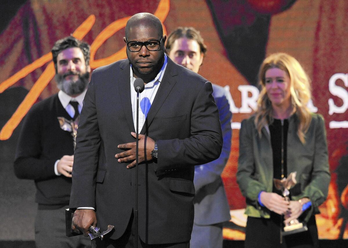 Steve McQueen accepts the best feature award for "12 Years a Slave" at the Film Independent Spirit Awards.