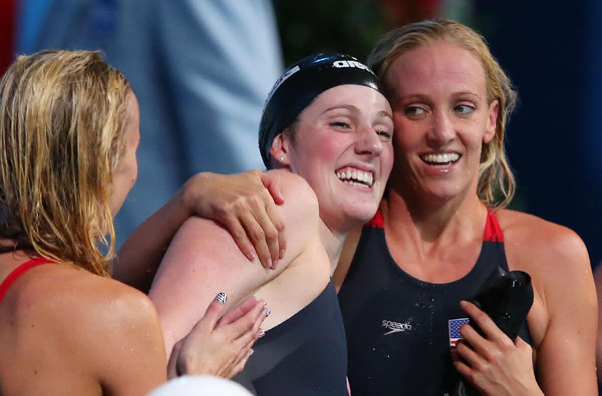 Missy Franklin celebrates with U.S. teammates Dana Vollmer and Jessica Hardy after the U.S. won the women's 400-meter medley relay at the world championships on Sunday in Barcelona, Spain.