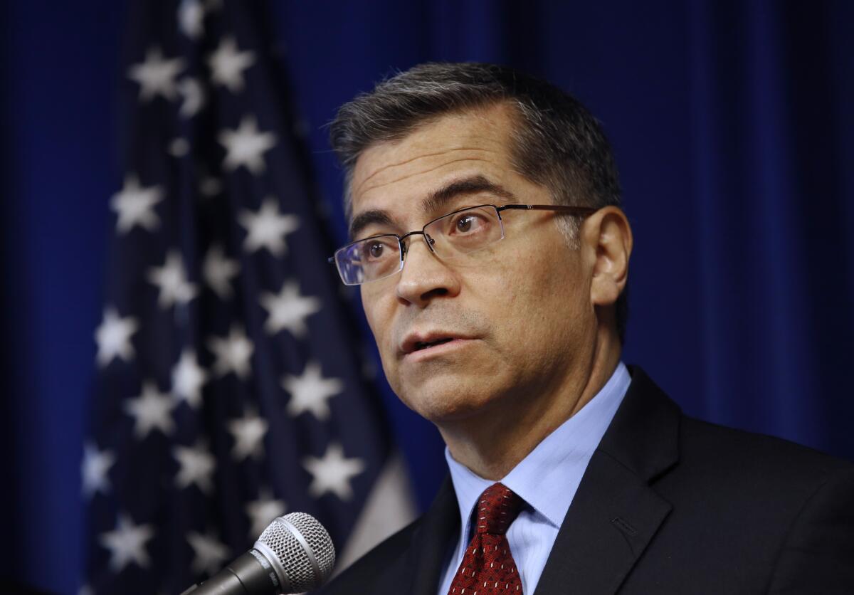 California Atty. Gen. Xavier Becerra speaks during a news conference in Sacramento in December 2019.