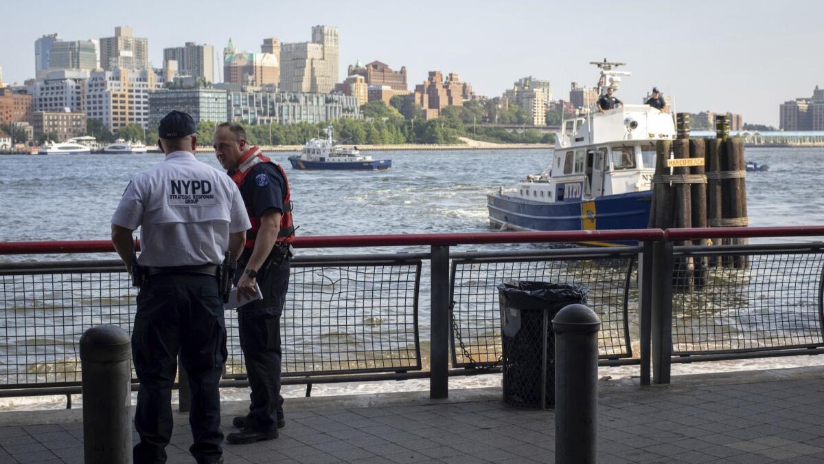 Authorities investigate the death of a baby boy who was found floating in the water near the Brooklyn Bridge on Aug. 5.