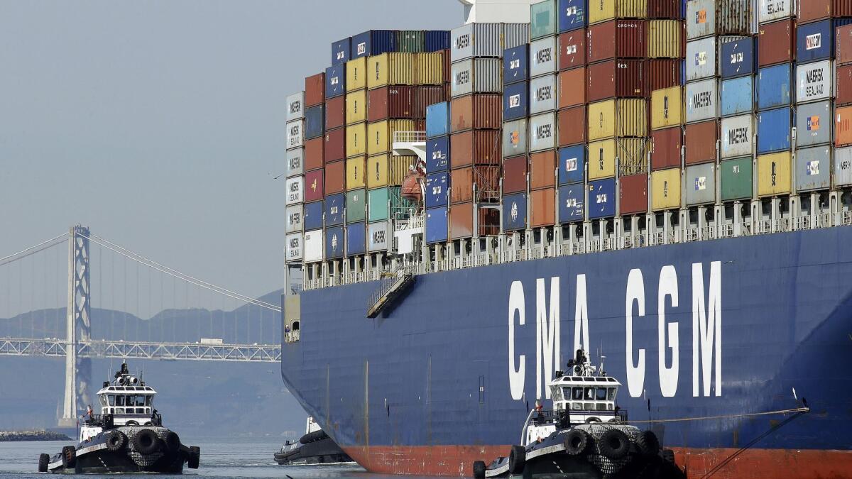 A container ship carrying imported goods arrives at the Port of Oakland on Feb. 12, 2015.