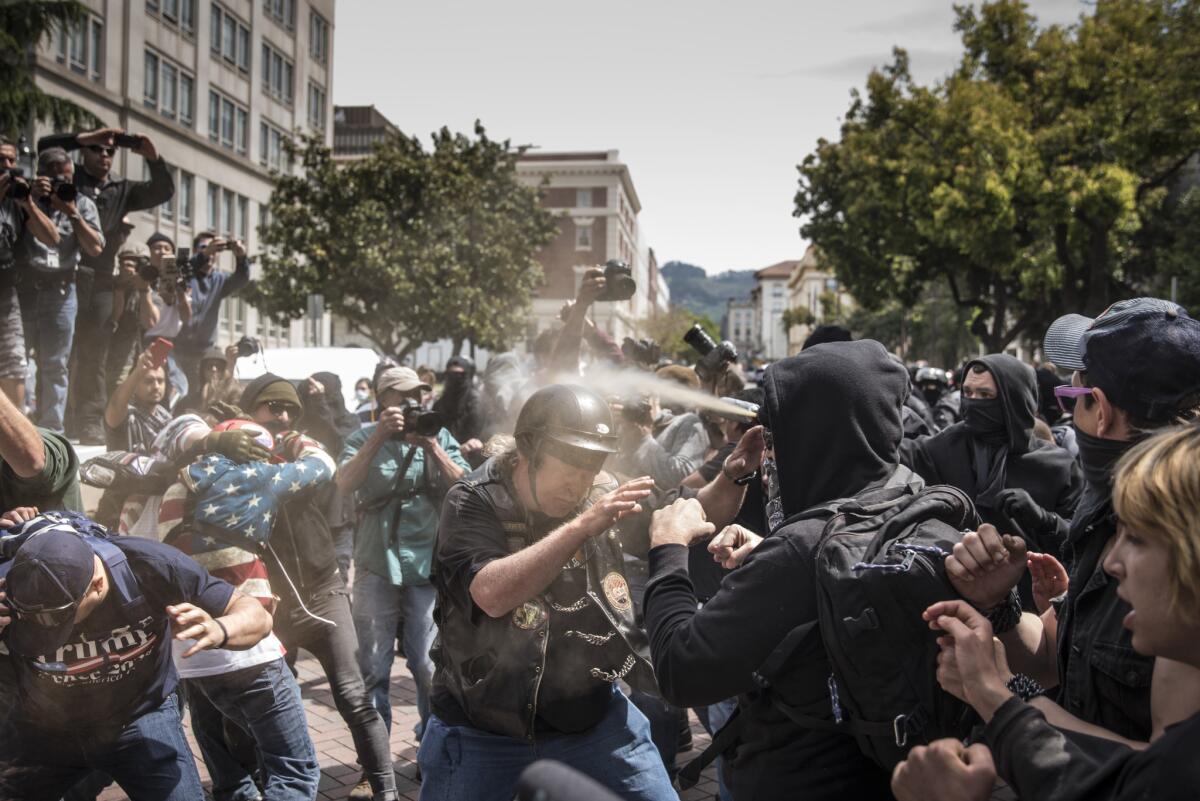 Pepper spray is used as anti-fascist and other groups clash Saturday in Berkeley.
