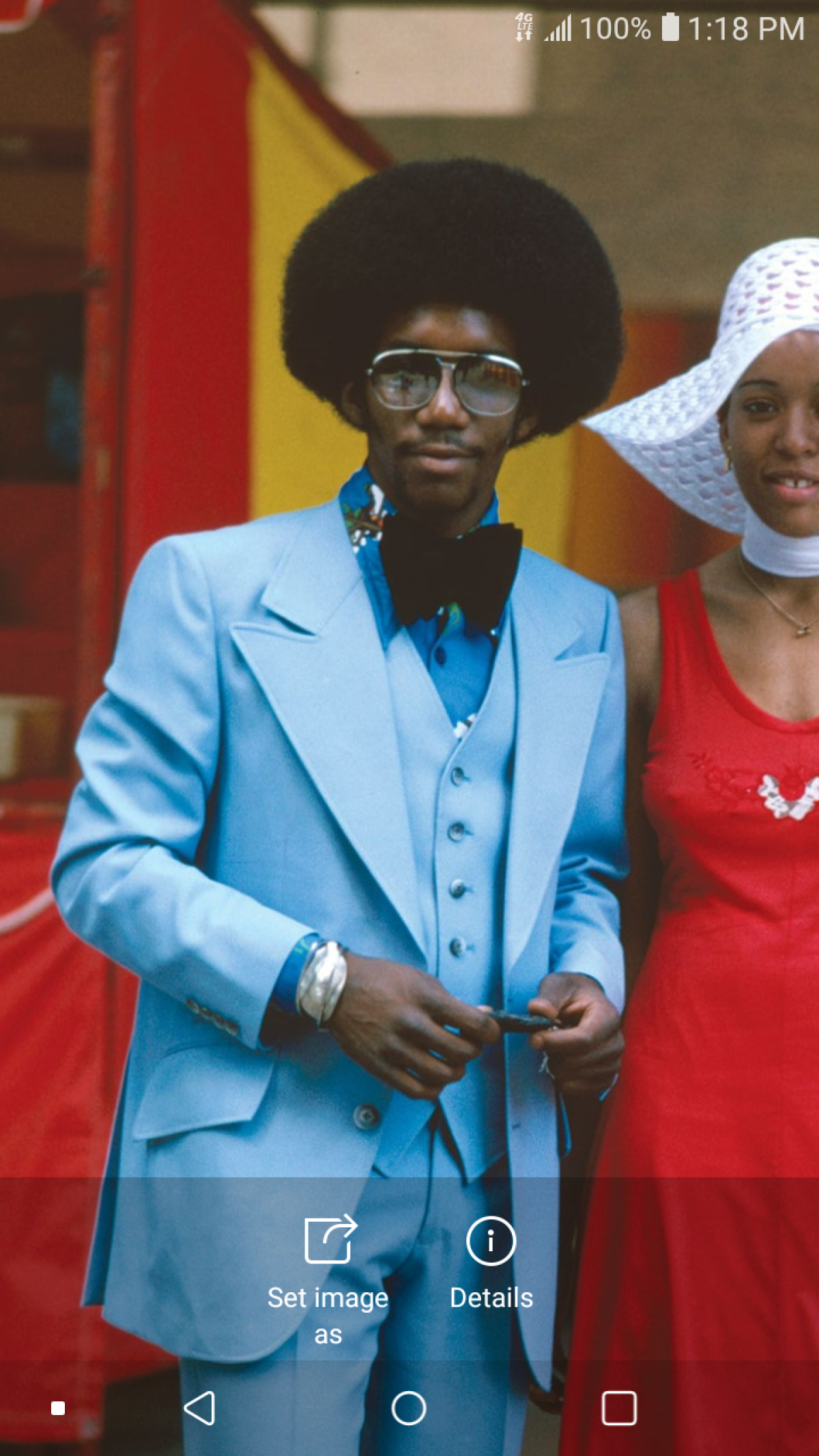 A man in a powder blue suit photographed in Chicago in 1975