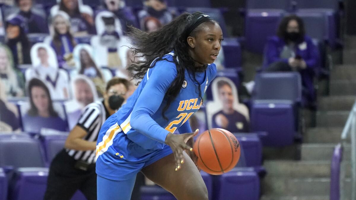 UCLA forward Michaela Onyenwere in action against Washington.