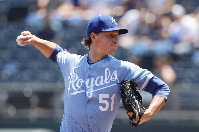 Kansas City Royals pitcher Brady Singer throws to a Colorado Rockies batter during the first inning of a baseball game in Kansas City, Mo., Sunday, June 4, 2023. (AP Photo/Colin E. Braley)