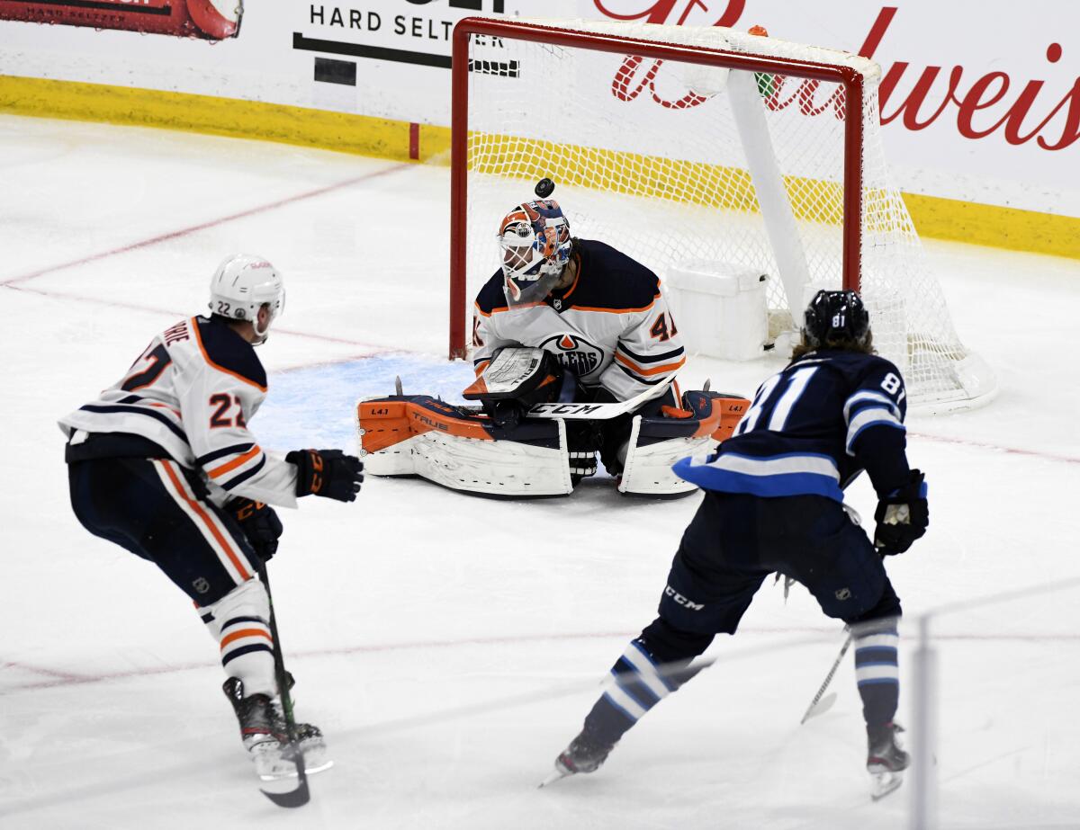 Jets finish off sweep of Oilers with 4-3 victory in 3 OTs - The San Diego  Union-Tribune