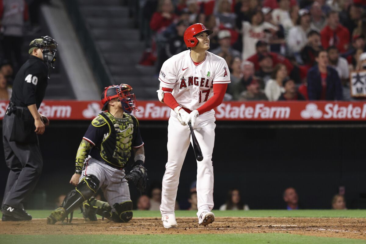 The Angels' Shohei Ohtani watches his solo home run during the sixth inning May 20, 2023. 