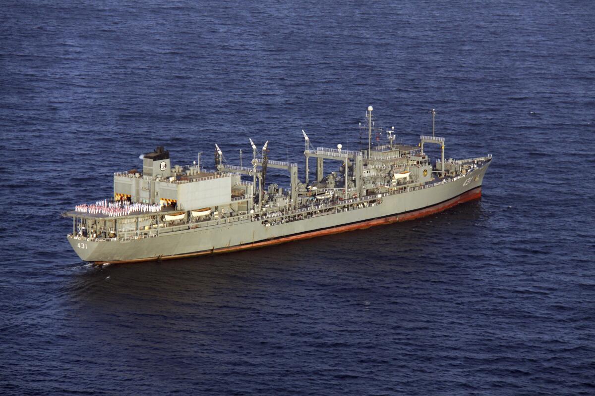 A naval ship in blue waters 