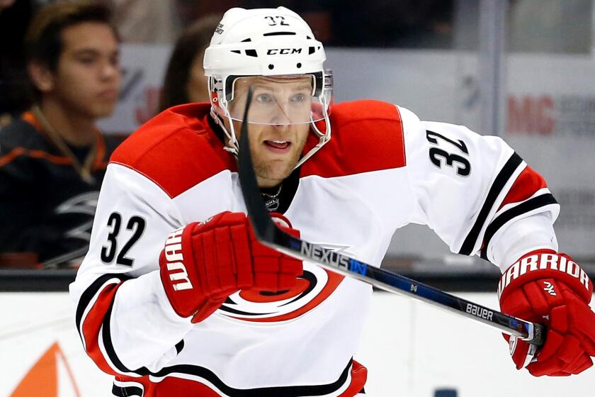 Kris Versteeg pursues a play during a game for the Hurricanes earlier this season in Anaheim.