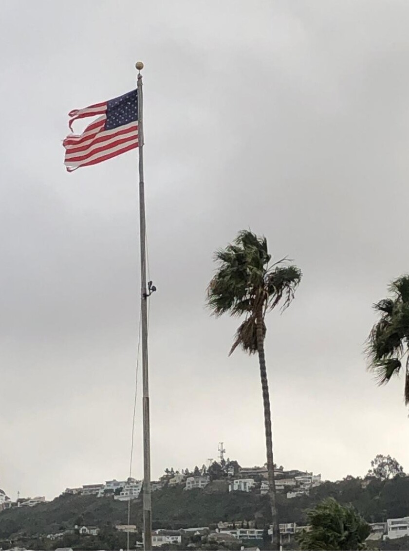 La Jolla resident Beth Gaenzle called the condition of the flag at Kellogg Park in La Jolla Shores "an embarrassment." 