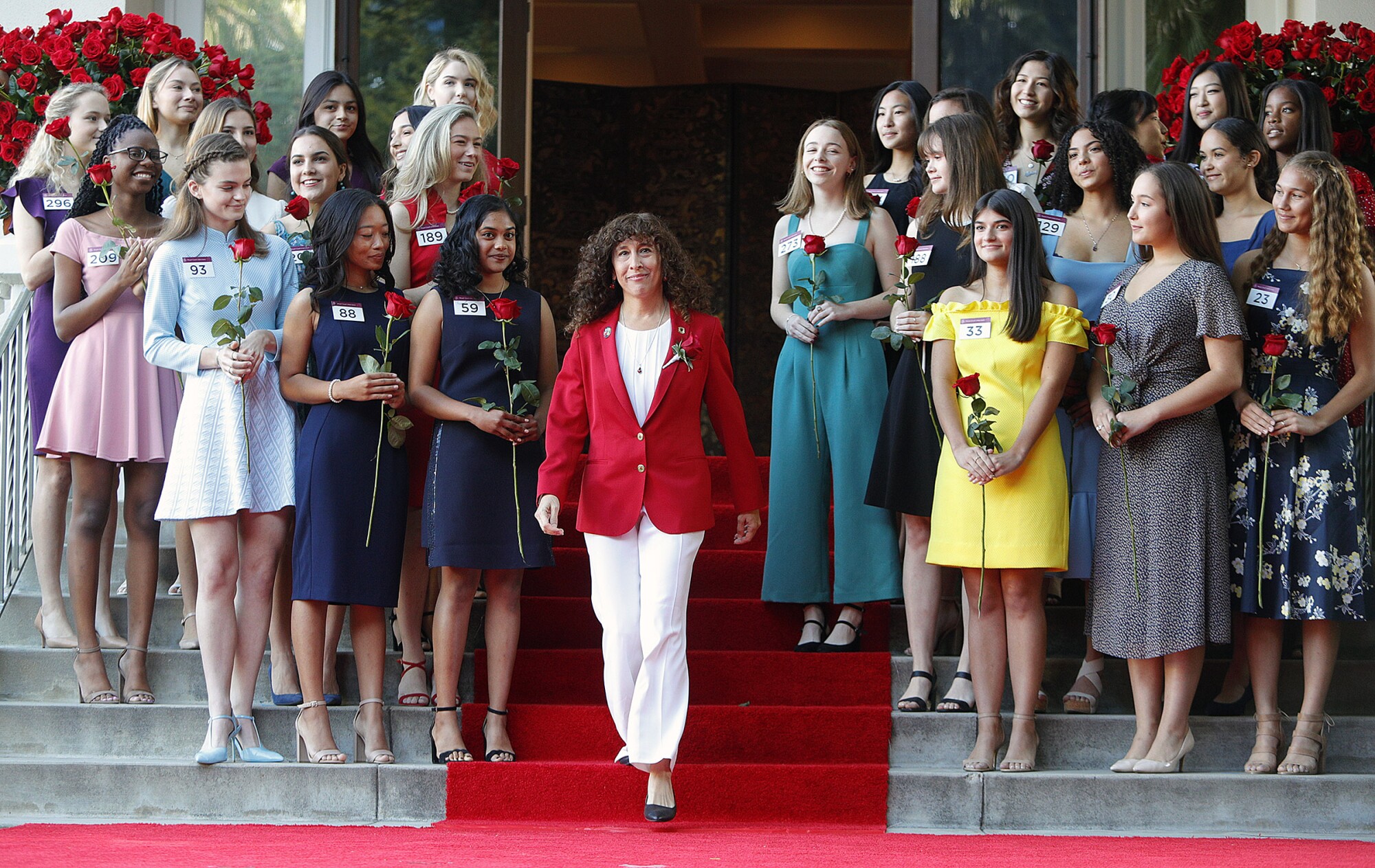 Laura Farber, president of the 2020 Tournament of Roses, steps to the stage to announce the 2020 Royal Court.