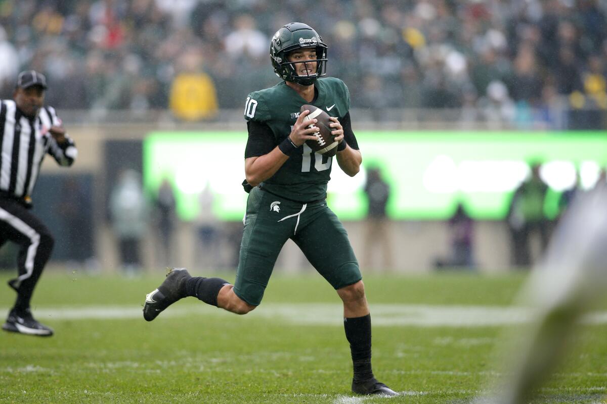 Michigan State quarterback Payton Thorne looks to pass during a win over Michigan State on Oct. 30.