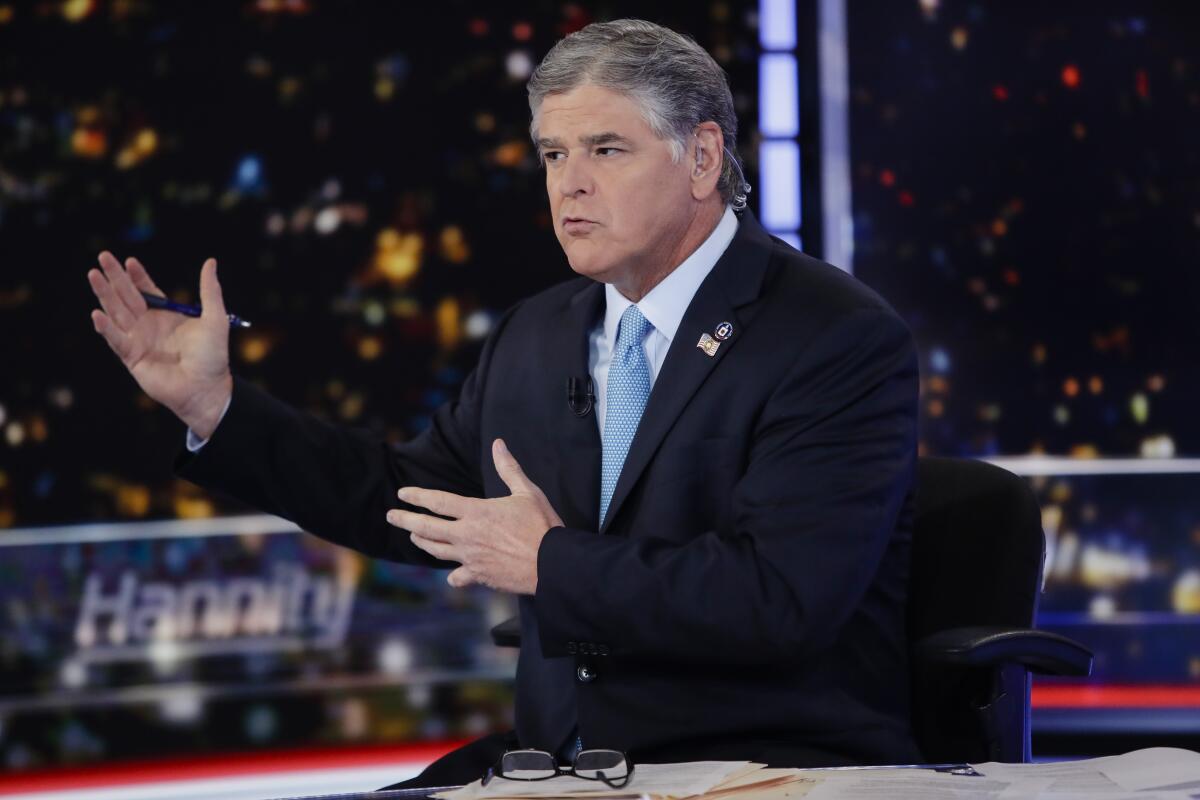 Sean Hannity speaks during a taping of his show.