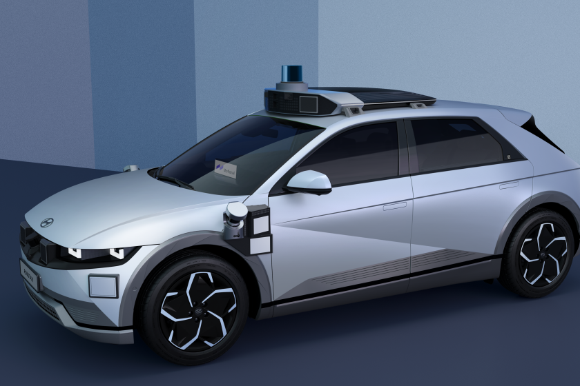 Image of a Motional robotaxi, built on Hyundai Ioniq 5 motor vehicle platform. Lidar sensor system sits atop the car.