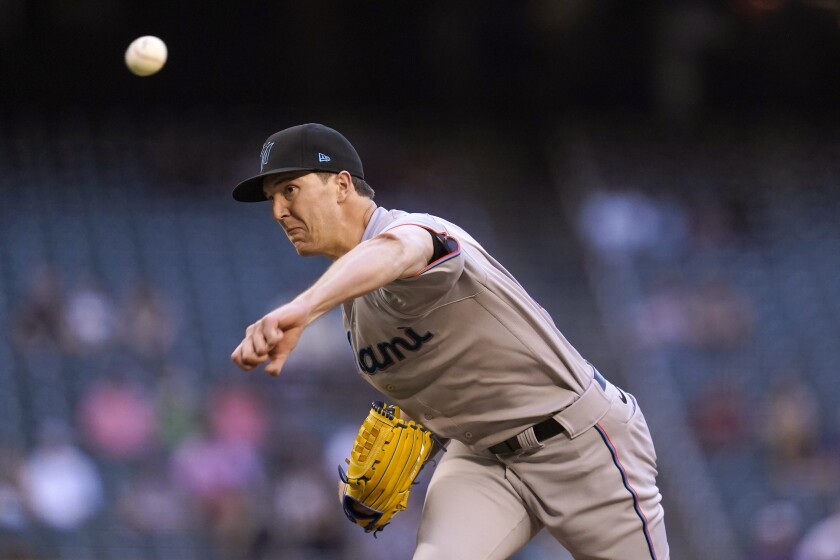 Miami Marlins starting pitcher Trevor Rogers throws against the Arizona Diamondbacks during the first inning of a baseball game Thursday, May 13, 2021, in Phoenix. (AP Photo/Ross D. Franklin)