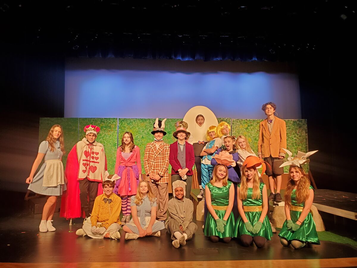 The eighth grade cast of "Alice in Wonderland".