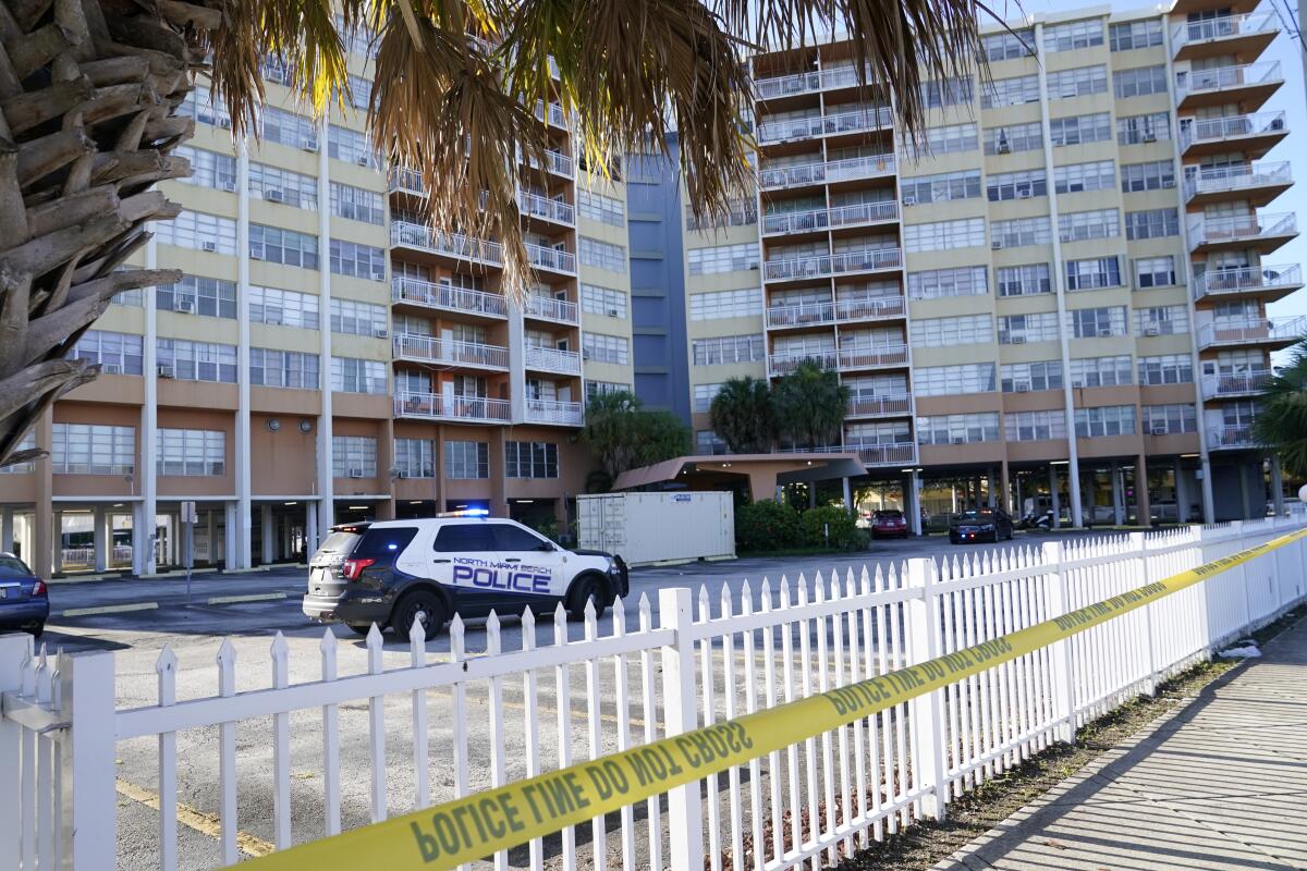 Police patrol outside of Crestview Towers, which was evacuated Friday after an audit prompted by the deadly collapse of Champlain Towers found the building structurally and electrical unsafe, Saturday, July 3, 2021, in North Miami Beach, Fla. (AP Photo/Lynne Sladky)