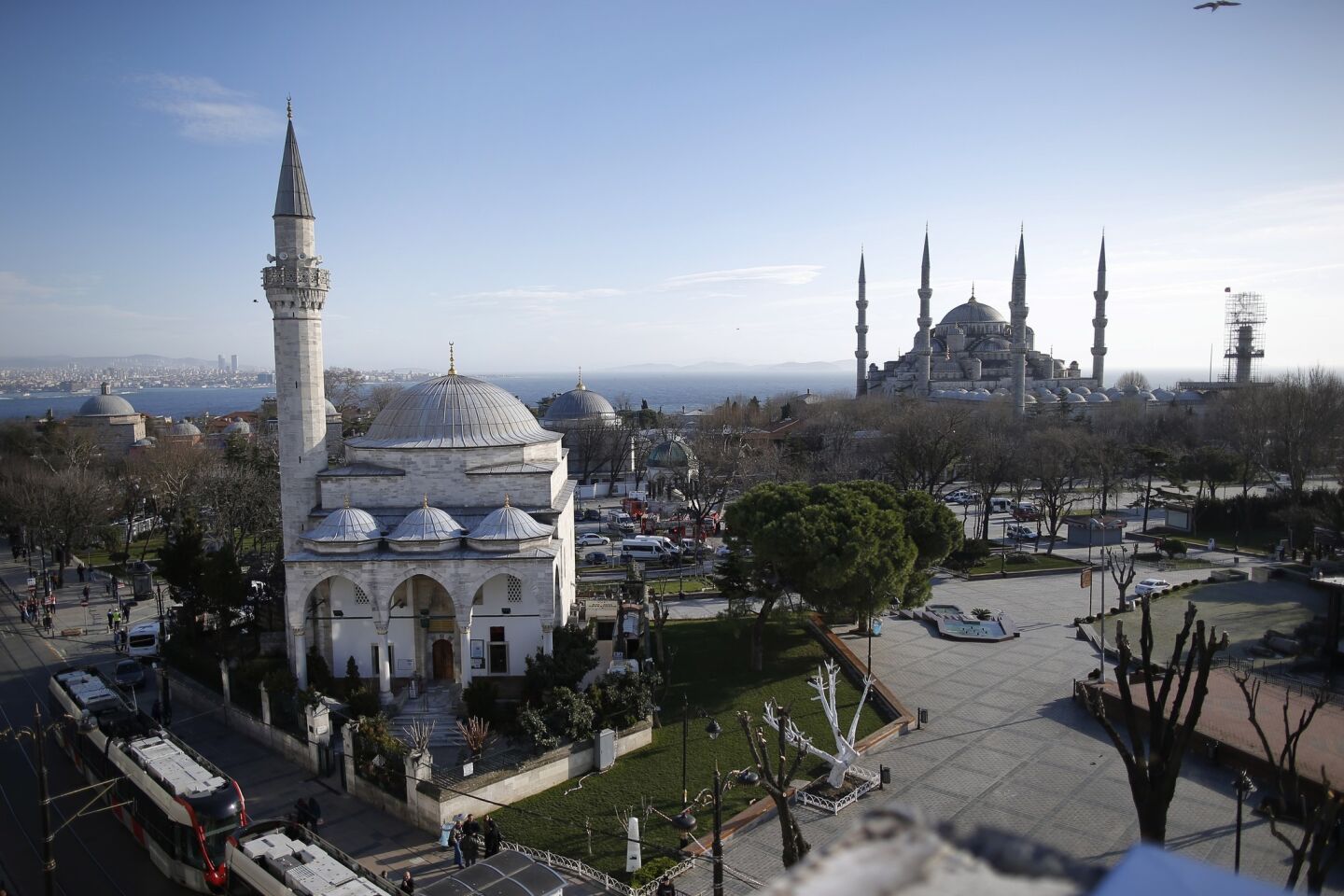 A view of the Sultan Ahmed Mosque, right, better known as the Blue Mosque in the historic Sultanahmet district of Istanbul, where an explosion killed 10 people and wounded more than a dozen others.
