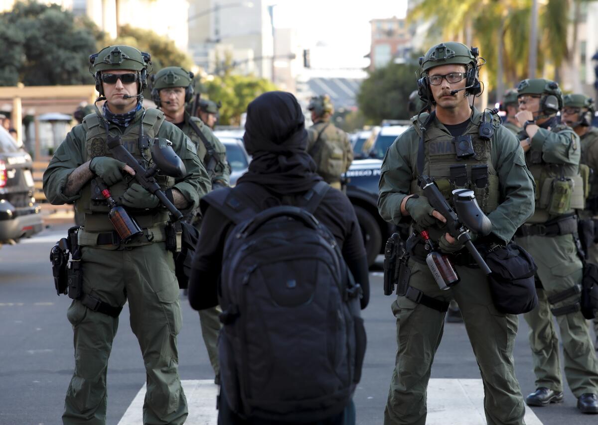 San Diego police officers in tactical gear.
