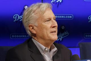 FILE - Los Angeles Dodgers owner and chairman Mark Walter speaks during a baseball news conference in Los Angeles on Sept. 21, 2018. Concerned over a possible bankruptcy of the company that owns local broadcasting rights for 14 of the 30 teams, Major League Baseball has formed a new economic study committee that will gather next week at the owners’ meetings in Palm Beach, Fla. Los Angeles Dodgers chairman Mark Walter and Detroit Tigers chairman Chris Ilitch are among the committee members, the person said. (AP Photo/Alex Gallardo, File)
