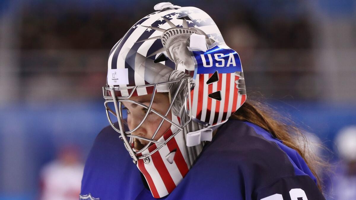 U.S. goalie Nicole Hensley made 13 saves during a shutout of the Olympic Athletes from Russia, and didn't have to alter her mask.