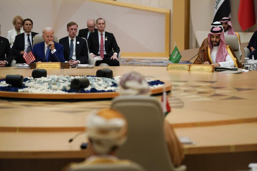 President Biden and Saudi Crown Prince Mohammed bin Salman, far right, attend the Gulf Cooperation Council Saturday.