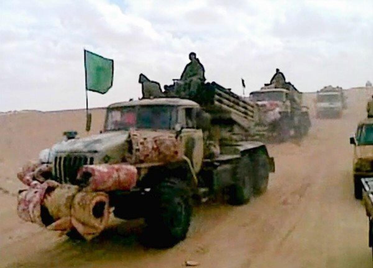 A cellphone image shows a militant convoy in the Malian desert. The French military intervention in Mali and a terrorist attack on a gas complex in neighboring Algeria have prompted debate in Washington over whether the threat warrants a military response.
