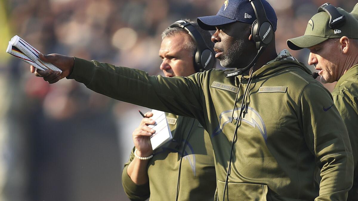 Chargers head coach Anthony Lynn gestures during the first half of a game against the Oakland Raiders in Oakland on Nov. 11, 2018.