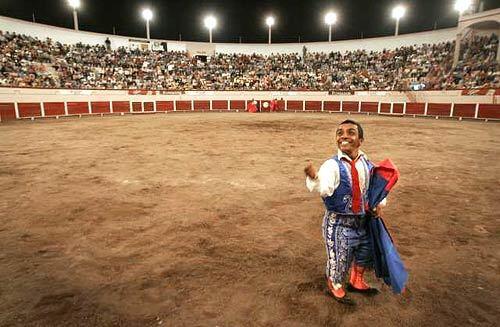 A matador acknowledges the crowd's cheers in the bullfighting ring in Aguascalientes, Mexico.