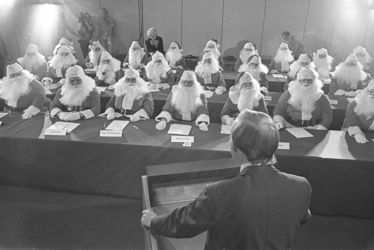 Twenty-eight men in Santa suits.