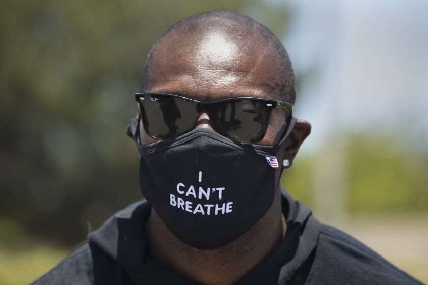 Retired NFL wide receiver and hall of famer Terrell Owens, leads a protest outside of Sofi Stadium.