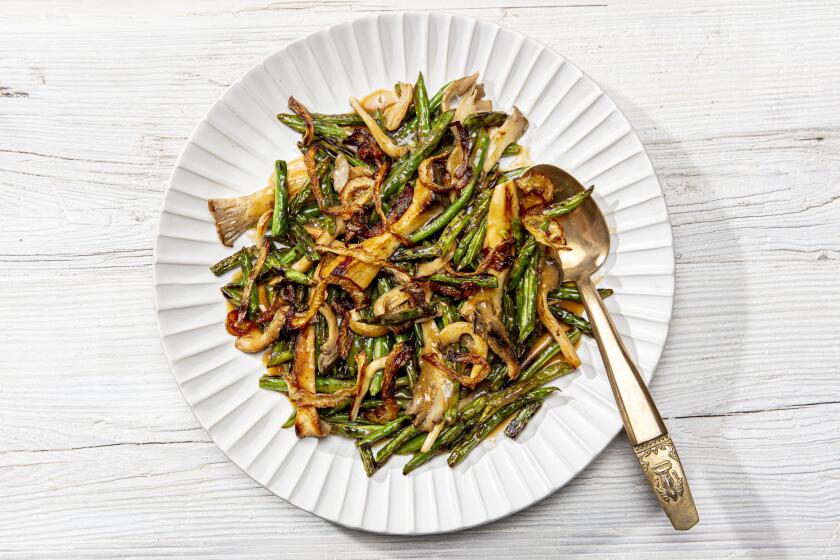 LOS ANGELES, CALIFORNIA, Nov. 4, 2020: Dry-Fried Green Beans and Mushrooms with Crispy Onions for LA Times Cooking section's Thanksgiving 2020 story and recipes by Ben Mims, photographed on Wednesday, Nov 4, 2020, at Proplink Studios in Arts District Los Angeles. (Photo / Silvia Razgova, Food styling / Ben Mims, Prop styling/ Kate Parisian) ATTN: 644074-la-fo-new-thanksgiving-2020