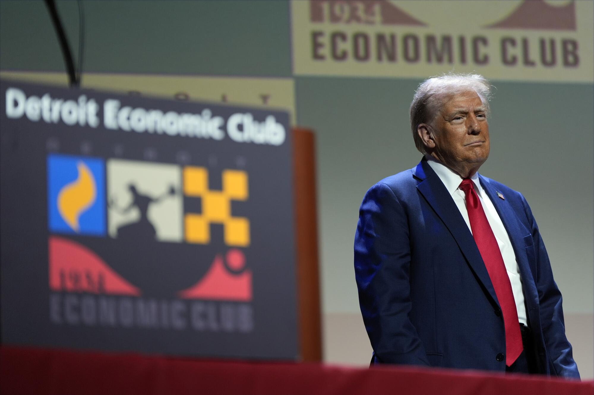 Donald Trump arrives to speak at a meeting of the Detroit Economic Club on Thursday in Detroit. 