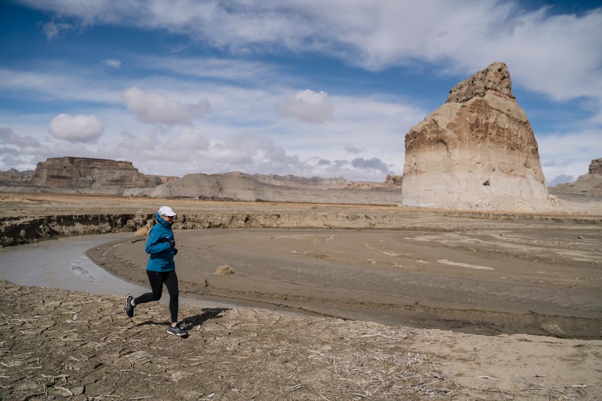 Mina Guli runs marathon around Lake Powell, finishing at Lone Rock. 