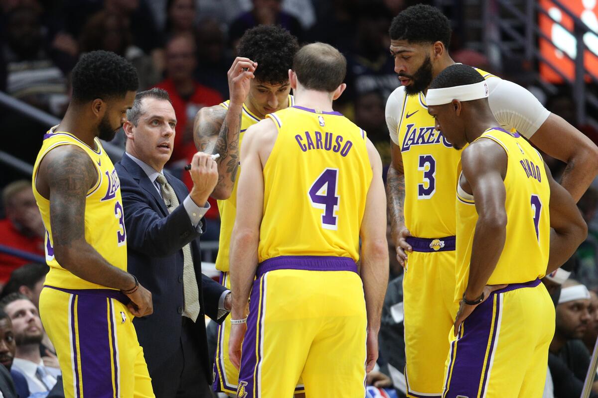 Lakers coach Frank Vogel talks with his team during a game against the New Orleans Pelicans on Nov. 27, 2019 in New Orleans.