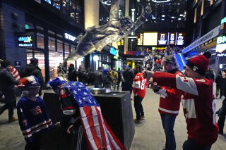 Canadian fans taunt U.S. fans at an international hockey tournament.