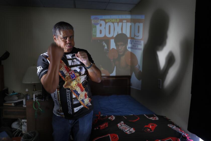 West Hills, CA, Tuesday, March 28, 2023 - Alex Ramos, 61, is a four-time Golden Glove winning middleweight with a pro record of 39-10-2 with 20 knockouts. He is currently owed $13,000 from the California Boxers' Pension. A native of New York City, he was officially endorsed by Yankees owner George Steinbrenner as the Bronx Bomber and wore pinstripes in the ring. Ramos, 61, now has dementia and other medical conditions that require him to live in an assisted living facility in West Hills. He said he has come to resent the sport he once loved. "Boxing is a sport that is terrible," Ramos said. "That's what I did for a living. I was good at it. I was on top of the world and all over the internet. But a lot of fighters end up hurt and damaged at the end of their career." After his fighting days were over, Ramos started the Retired Boxers Foundation to help fighters who found themselves homeless or in financial straits after leaving the ring. "We've been able to help hundreds of fighters," he said. "A lot of people called us and there are still people needing help."(Robert Gauthier/Los Angeles Times)