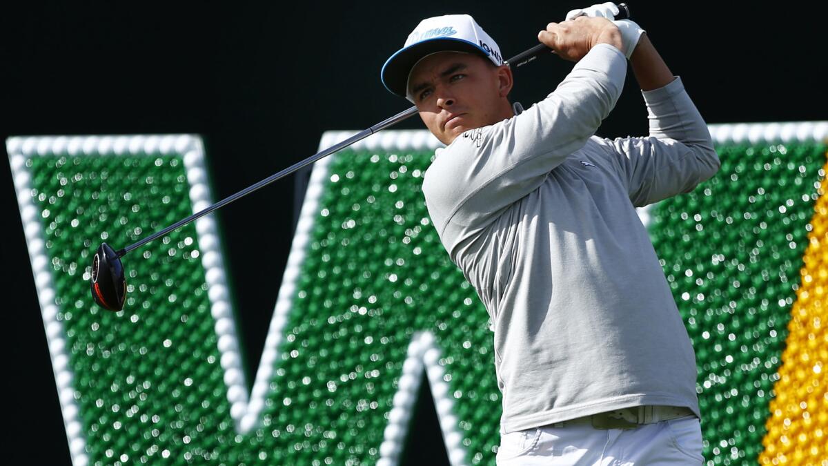 Rickie Fowler tees off at No. 17 on Thursday during the first round of the Phoenix Open.