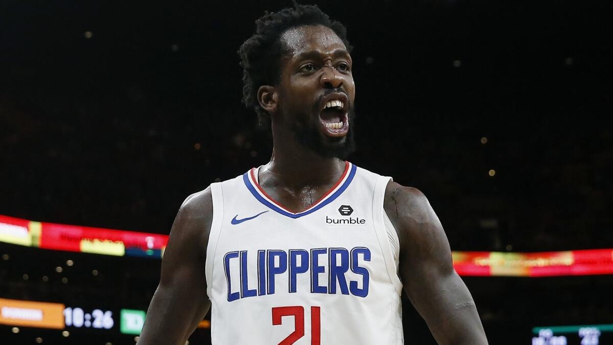 Clippers guard Patrick Beverley reacts during a game against the Boston Celtics on Feb. 9.