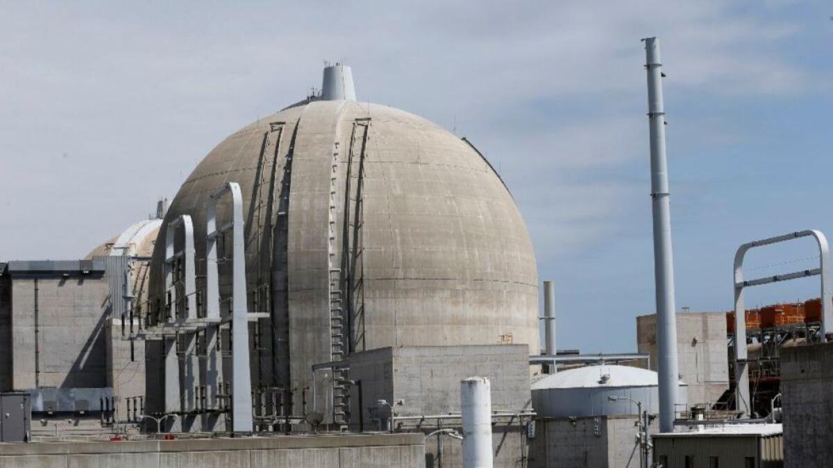A view of the electricity switch yard, shown at far left, where the general area of two-thirds of SONGS used nuclear fuel is stored in wet storage at unit #2, where the dome is visible, inside the closed San Onofre Nuclear Generating Station in San Clemente on May 9, 2017.