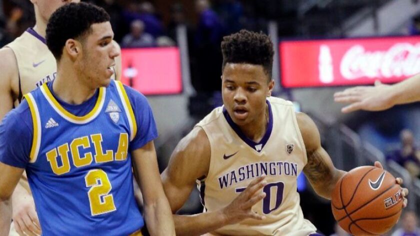 Washington's Markelle Fultz is defended by UCLA's Lonzo Ball during the first half of a game in Seattle on Feb. 4.