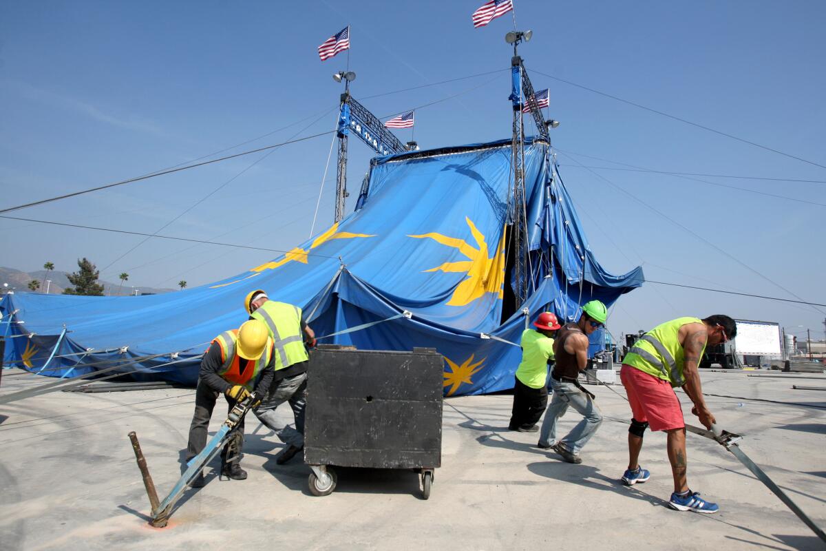 Workers set up the Circus Vargas big top for their new show "iLUMINOUS" on the 700 block of Front St. in Burbank on Tuesday, May 10, 2016. The show opens Thursday and runs for two weeks.