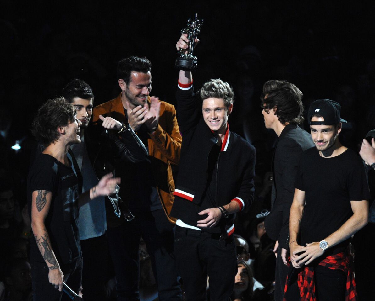 Musical group One Direction accepts the award for song of the summer.