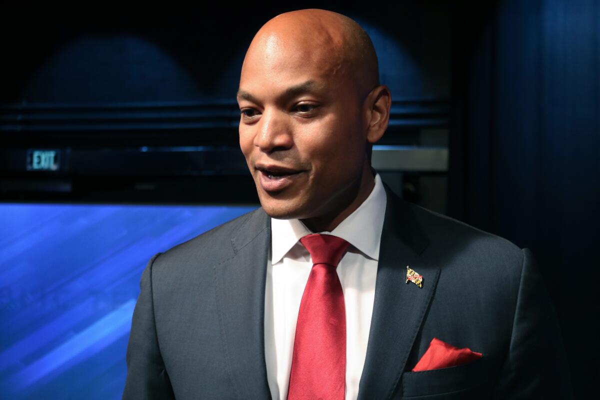 FILE - Maryland Democrat Wes Moore talks to reporters on June 6, 2022 in Owings Mills, Md., after a Democratic primary debate for governor of Maryland. Bestselling author Moore won the Democratic primary for Maryland governor on Friday, July 22, 2022, setting up a general election contest against Republican Dan Cox, a hard-line conservative endorsed by former President Donald Trump. (AP Photo/Brian Witte, File)