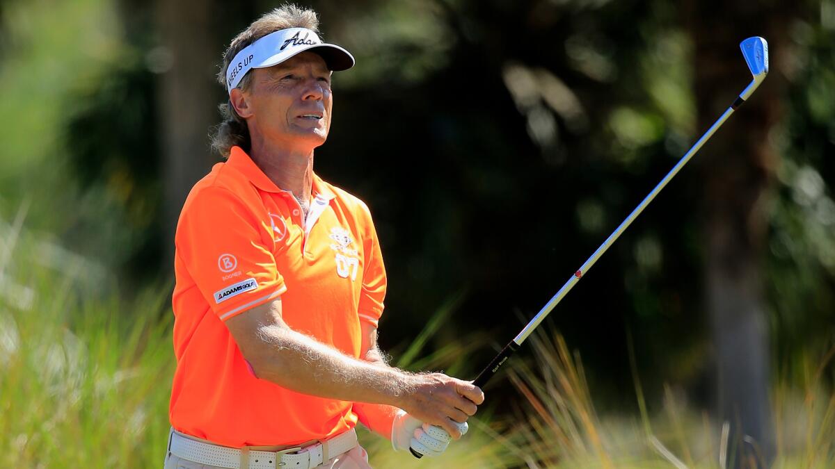 Bernhard Langer watches his tee shot at the second hole during the final round of the Chubb Classic on Sunday.