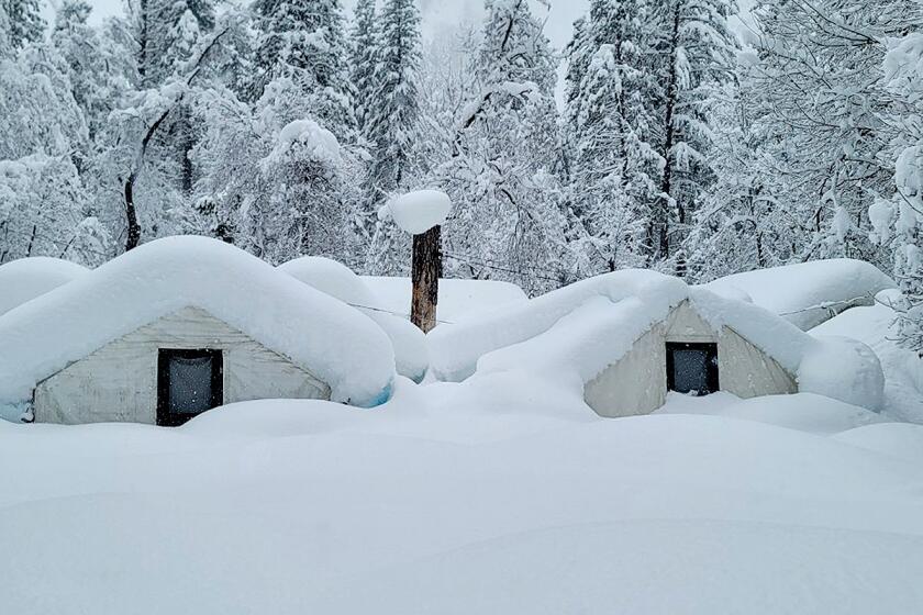 Tent cabins are buried as Yosemite National Park has experienced significant snowfall in all areas of the park, with snow up to 15 feet deep in some areas. Park crews are working to restore critical services so visitors can safely return. There is no estimated date for reopening.