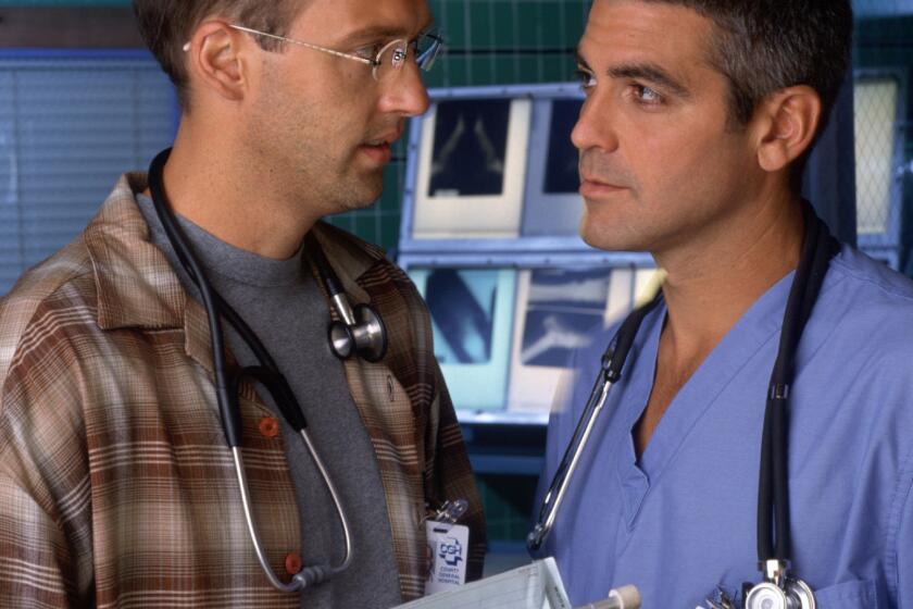NBC115 8/19/97 ER –– LIVE SEASON PREMIERE –– TELECASTS: Thurs., Sept. 25 (10–11 p.m. ET) –– PICTURED: (l–r) Anthony Edwards, George Clooney –– `ER' GOES LIVE IN SEASON PREMIERE –– `ER,' starring Edwards and Clooney as doctors at a fast–paced chicago hospital, kicks off season four with a live premiere episode on September 25. NBC Photo: Sven Arnstein.